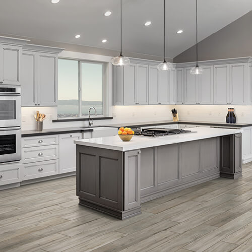 Inspiring kitchen roomscene with wood-look tile floors